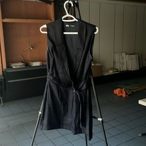 Navy Blue Romper, deep open V in front. ZARA size M.